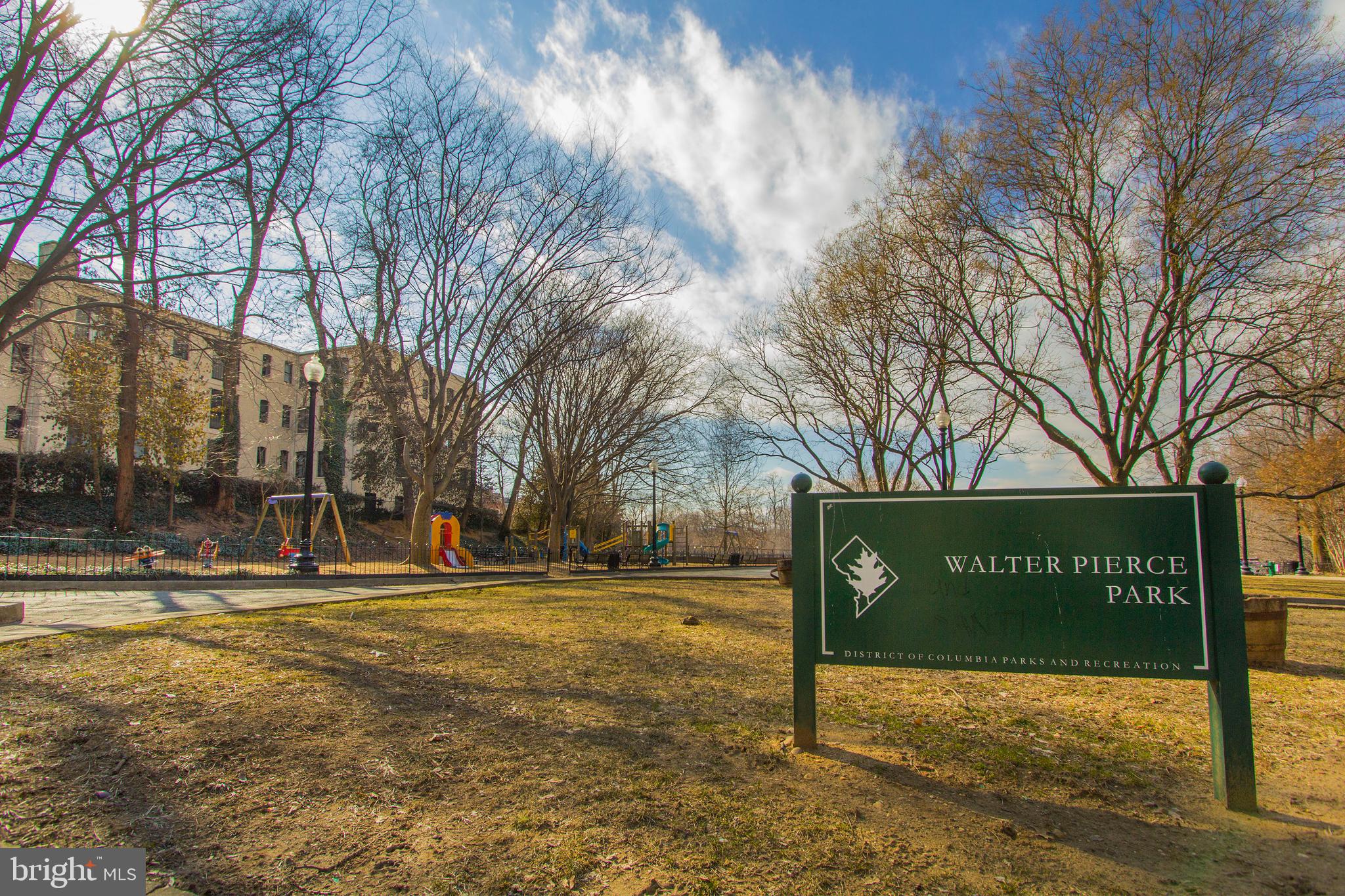 1736 Columbia Road Northwest, Unit 102 Washington, DC 20009 - Photo 36 of 39 a view of street with sign board