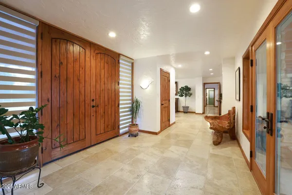 a view of a livingroom with furniture and front door