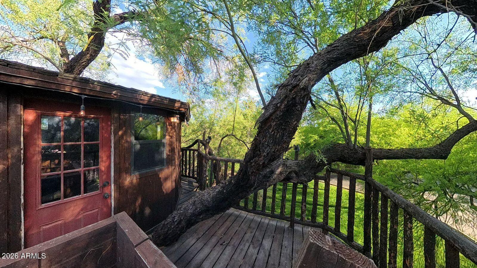 8741 East Woodland Road Tucson, AZ 85749 - Photo 39 of 51 a view of stairs and a yard