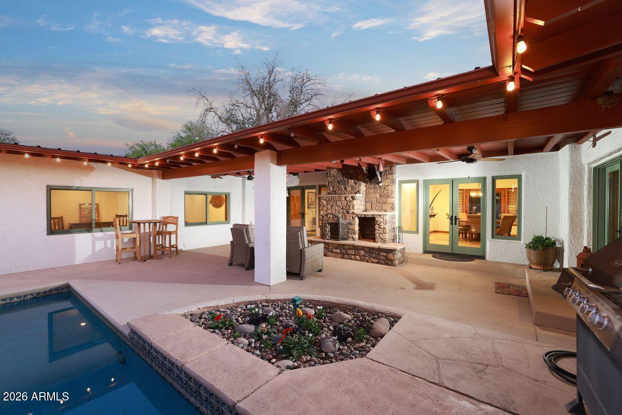 8741 East Woodland Road Tucson, AZ 85749 - Photo 42 of 51 a large room with table and chairs