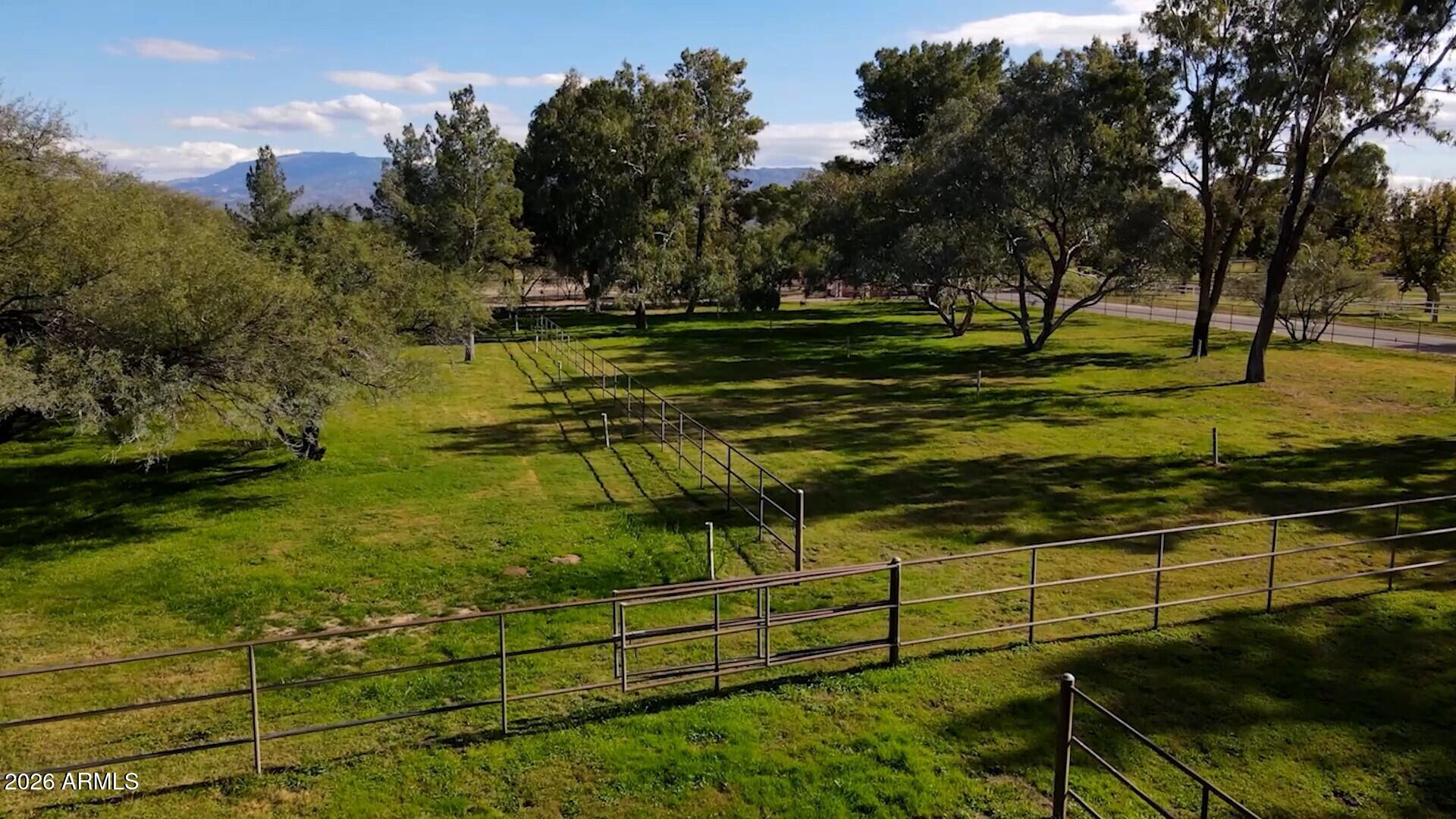 8741 East Woodland Road Tucson, AZ 85749 - Photo 6 of 51 a view of a park with large trees