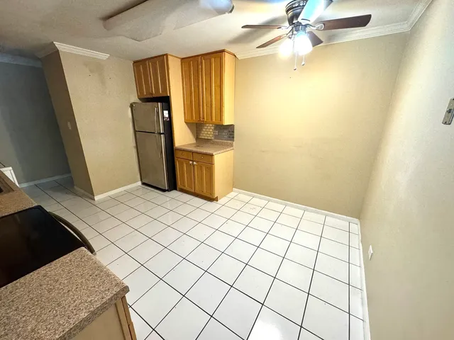 a view of a utility room with closet