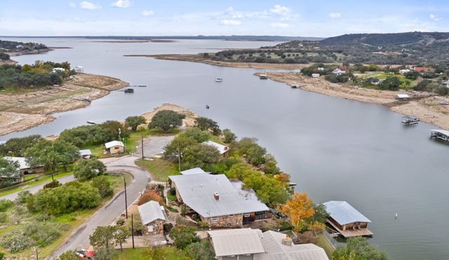 an aerial view of a house with a outdoor space