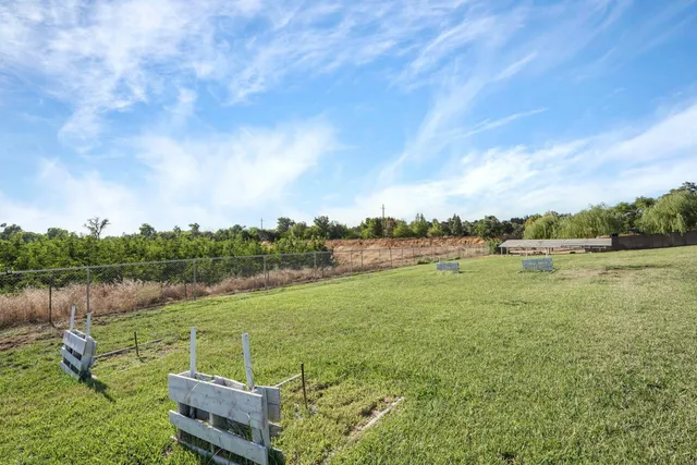a view of a lake with a big yard