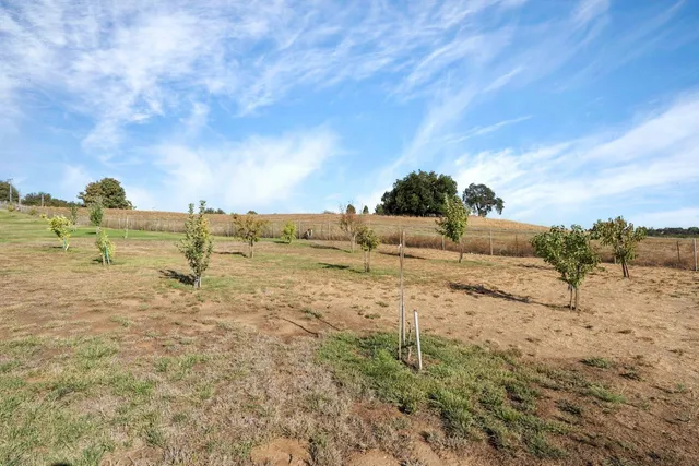a view of a table and chairs in patio