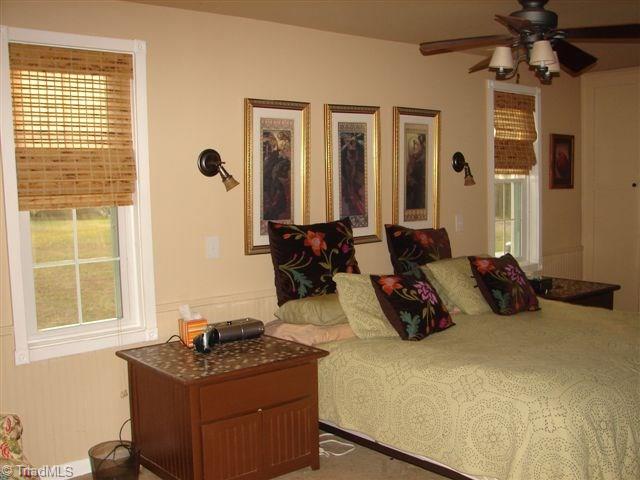 4904 Reeder Road Asheboro, NC 27205 - Photo 24 of 30 Master bedroom with lots of storage and walk-in closet located on the main level.