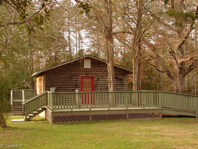 4904 Reeder Road Asheboro, NC 27205 - Photo 6 of 30 Studio has gas heat w/ wall AC unit (800 SF) finished w/ 200 amp electrical service separate from the main house. Also has handicap ramp and lots of decking.