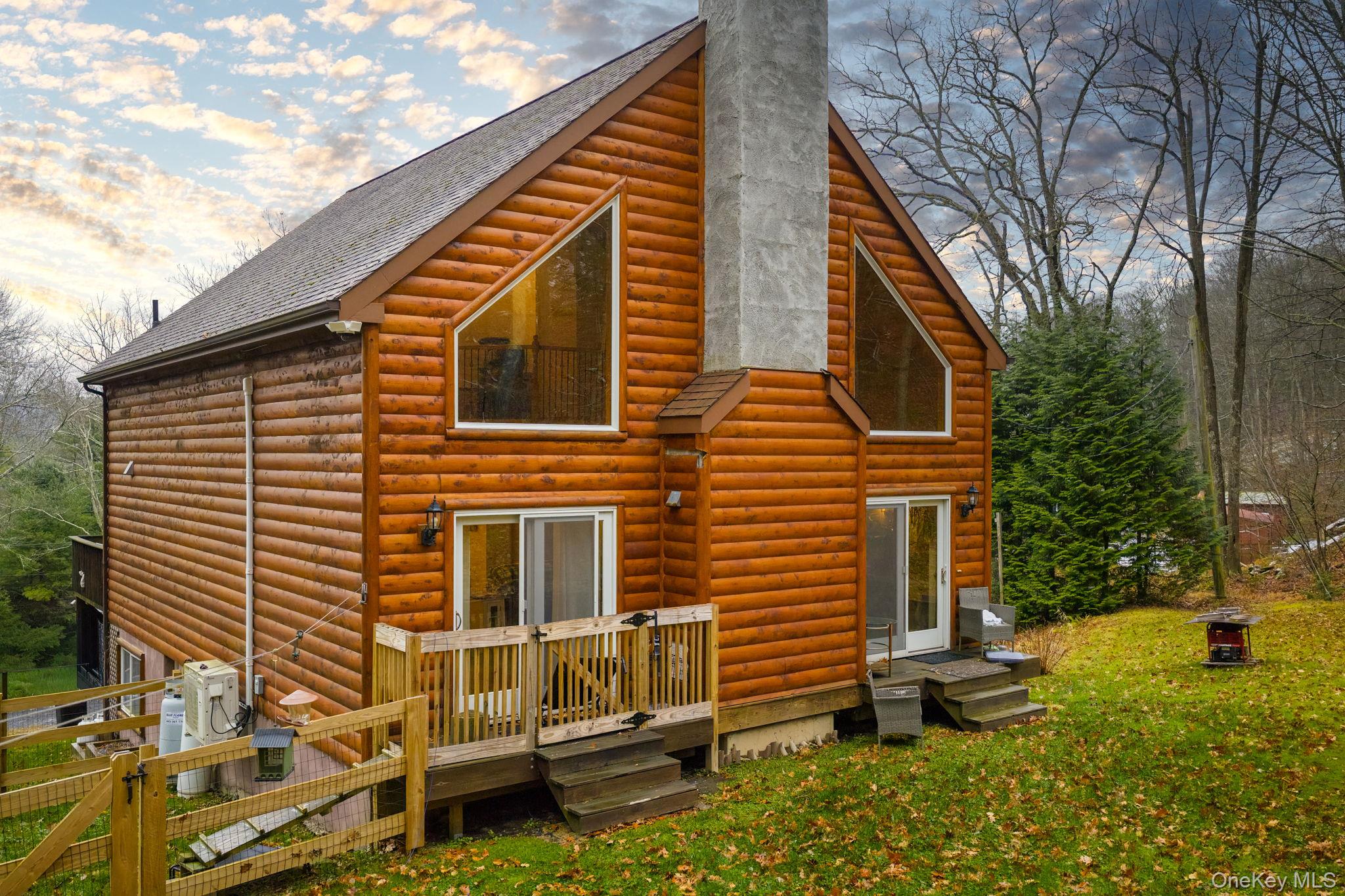 191 David Rhodes Road Wurtsboro, NY 12790 - Photo 2 of 39 a view of a house with a yard and furniture