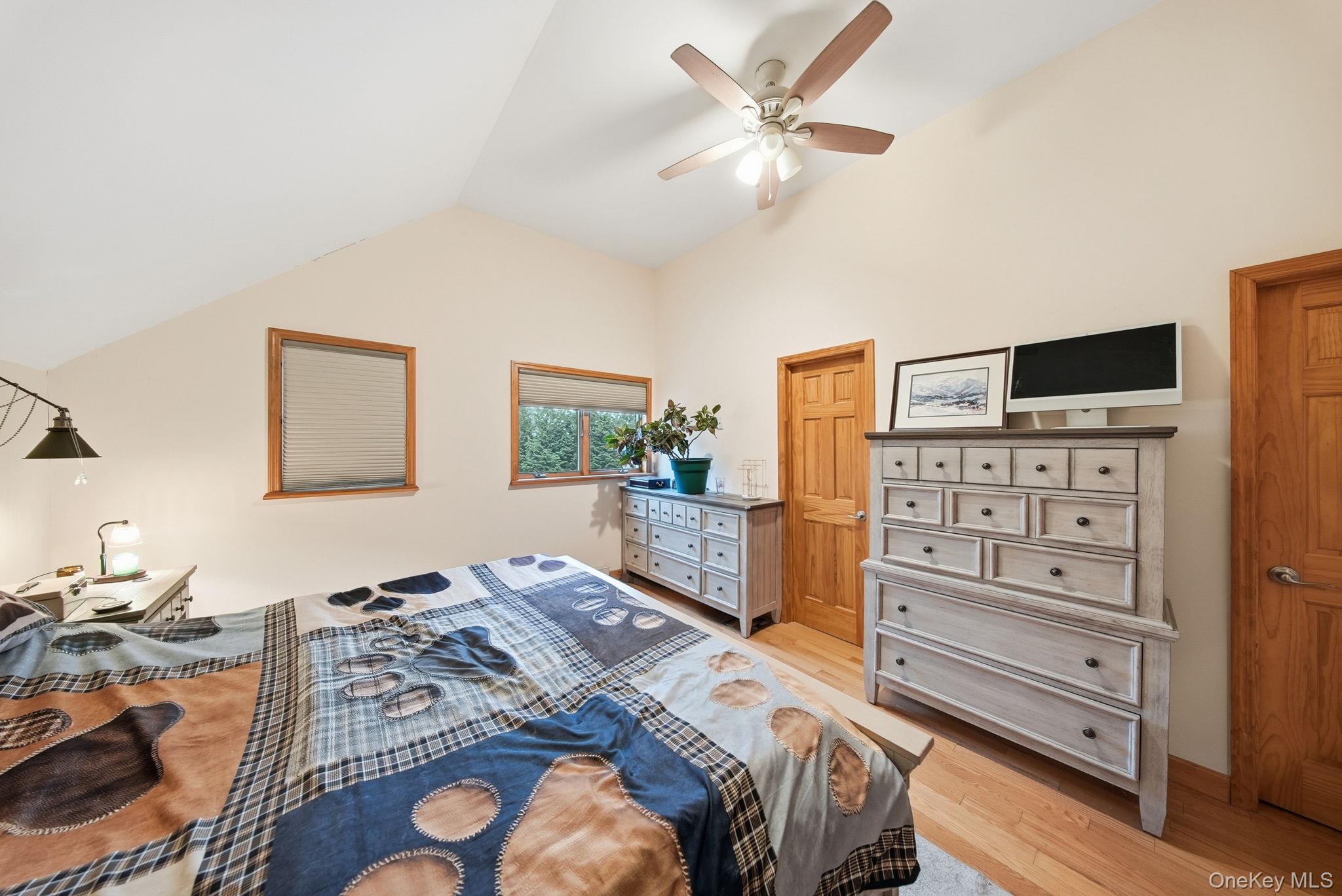 191 David Rhodes Road Wurtsboro, NY 12790 - Photo 22 of 39 a bedroom with a bed and a television