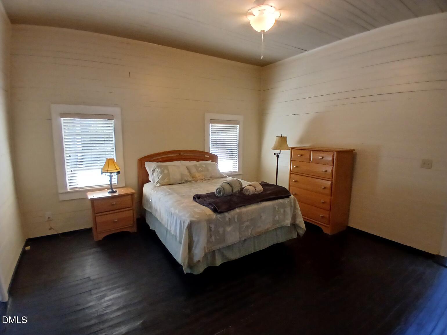 1920 Kelly Road Apex, NC 27502 - Photo 24 of 44 a bedroom with a bed and a window