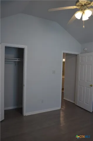 an empty room with a bathroom