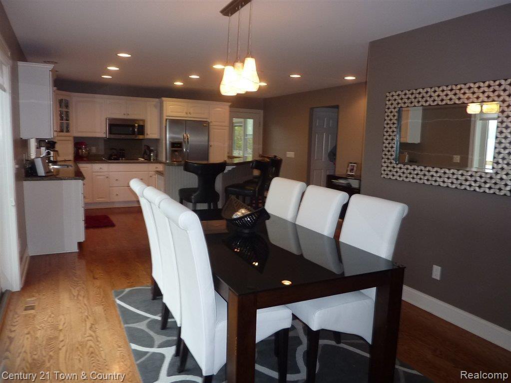 9255 Ridge Road Goodrich, MI 48438 - Photo 4 of 25 OPEN D/R WITH HRDWD FLOORS