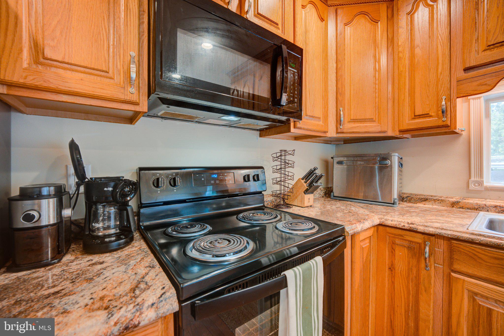 9595 Roys Lane Culpeper, VA 22701 - Photo 10 of 61 Warm wood tones in a cozy kitchen.