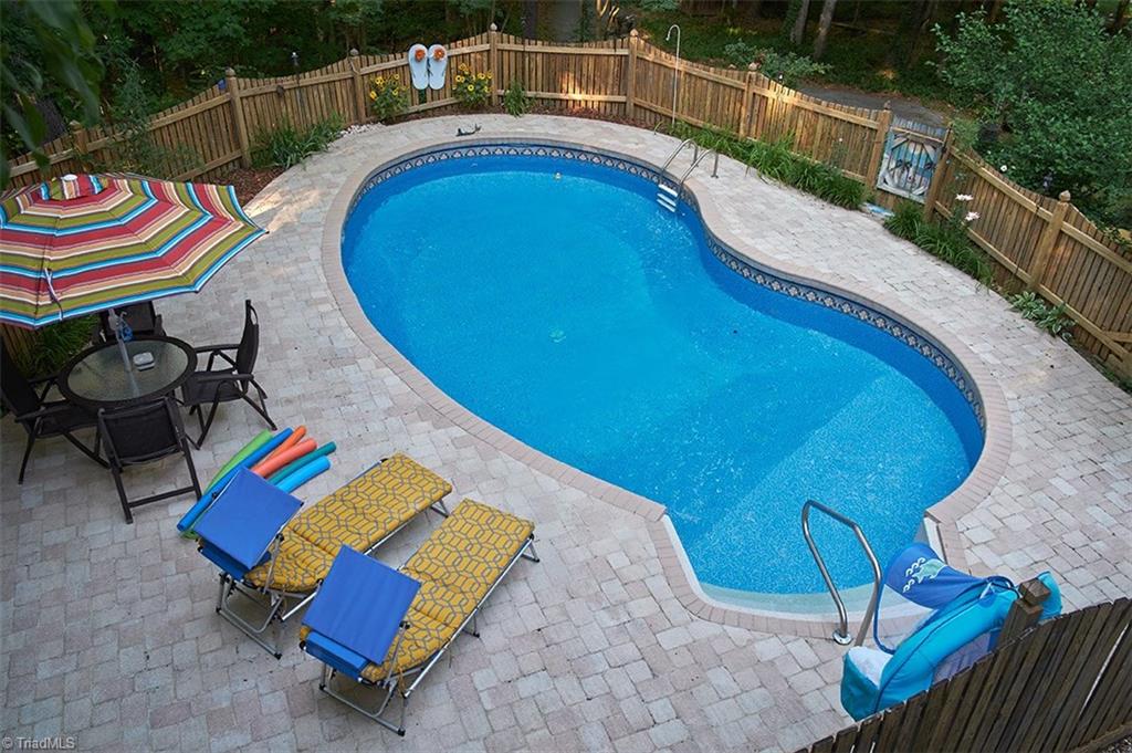 5205 Rambling Road Greensboro, NC 27409 - Photo 12 of 30 A refreshing pool & hot tub await you! This is your view from one of the decks!