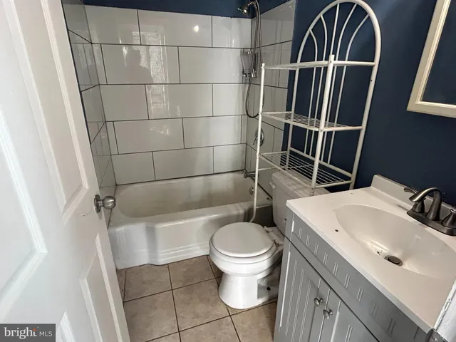 a bathroom with a sink and toilet