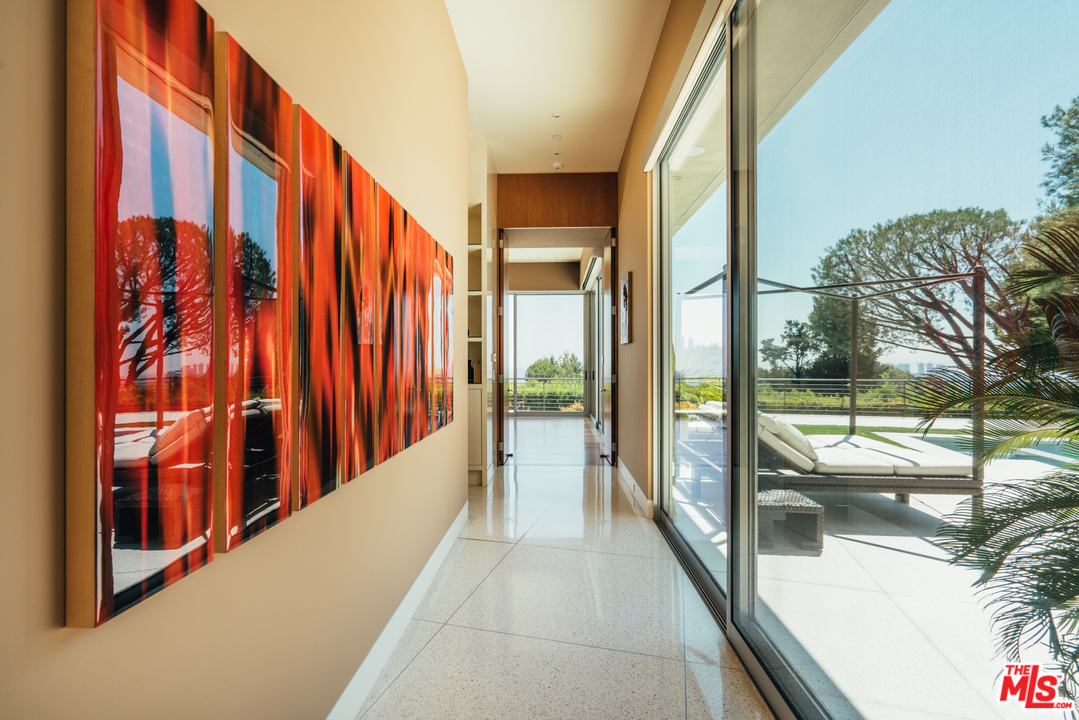1470 Carla Ridge Beverly Hills, CA 90210 - Photo 10 of 44 a view of balcony with furniture