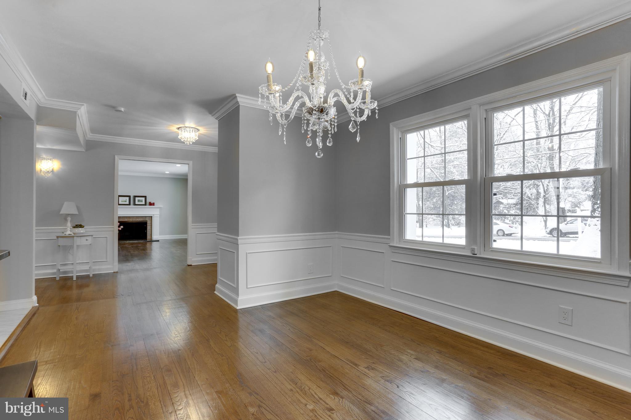 7124 Devonshire Road Alexandria, VA 22307 - Photo 12 of 66 Dining Room with wainscoting and crown Molding