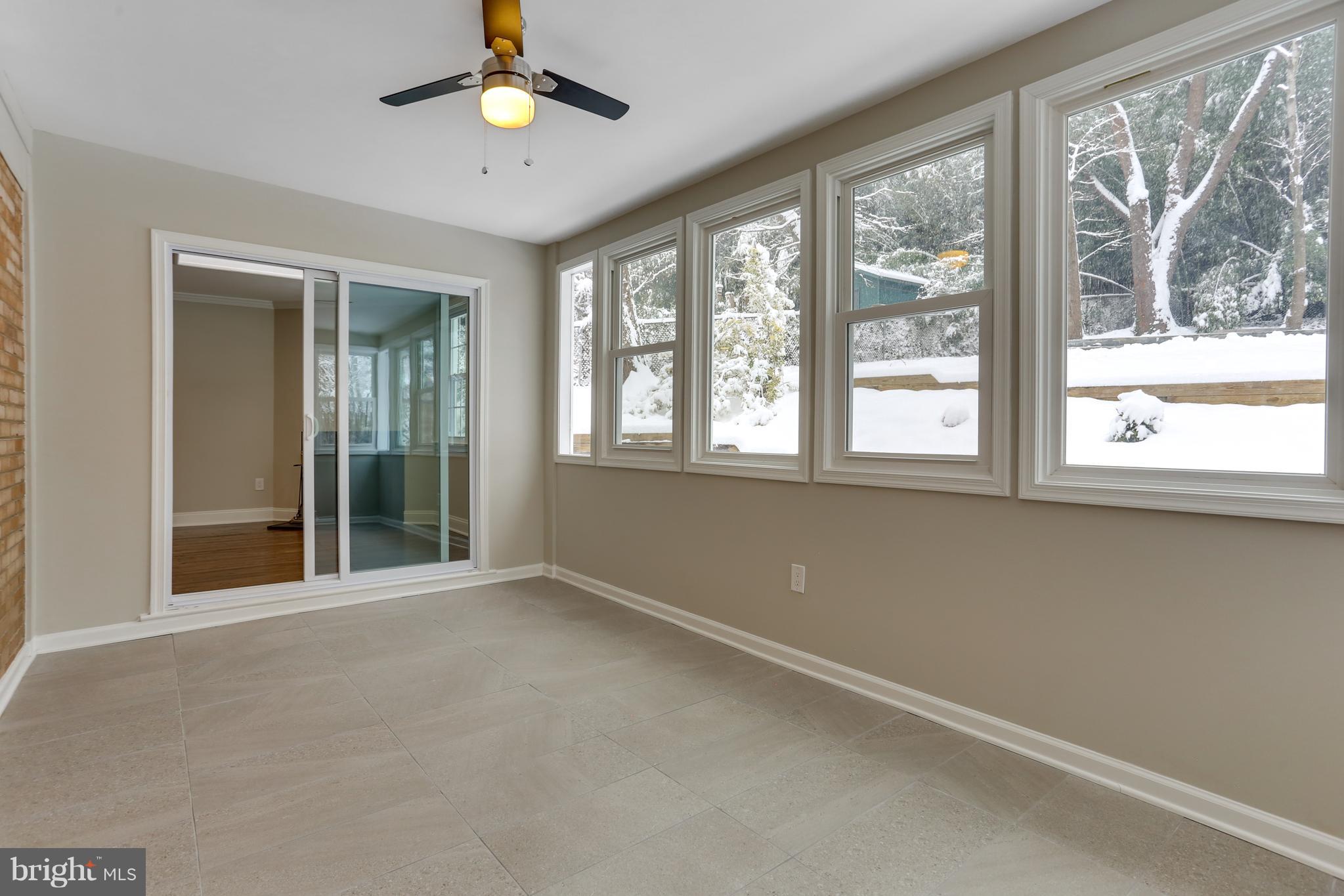 7124 Devonshire Road Alexandria, VA 22307 - Photo 43 of 66 Sun room with new ceramic tile floors