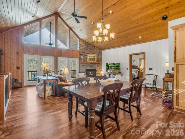 a view of a dining area with furniture window and wooden floor