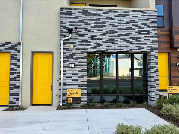 a front view of a house with a glass door