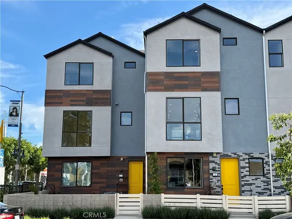 a front view of a house with glass windows