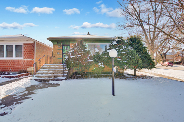 1067 West 97th Street Chicago, IL 60643 - Photo 1 of 15 a view of a house with basketball court