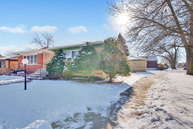 1067 West 97th Street Chicago, IL 60643 - Photo 2 of 15 a view of a house with a yard