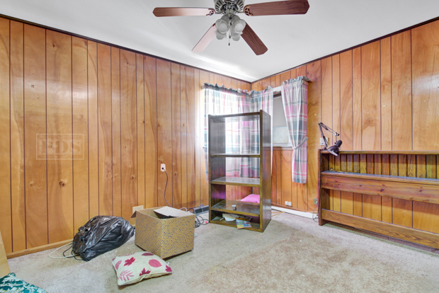 1067 West 97th Street Chicago, IL 60643 - Photo 10 of 15 a livingroom with furniture and toys