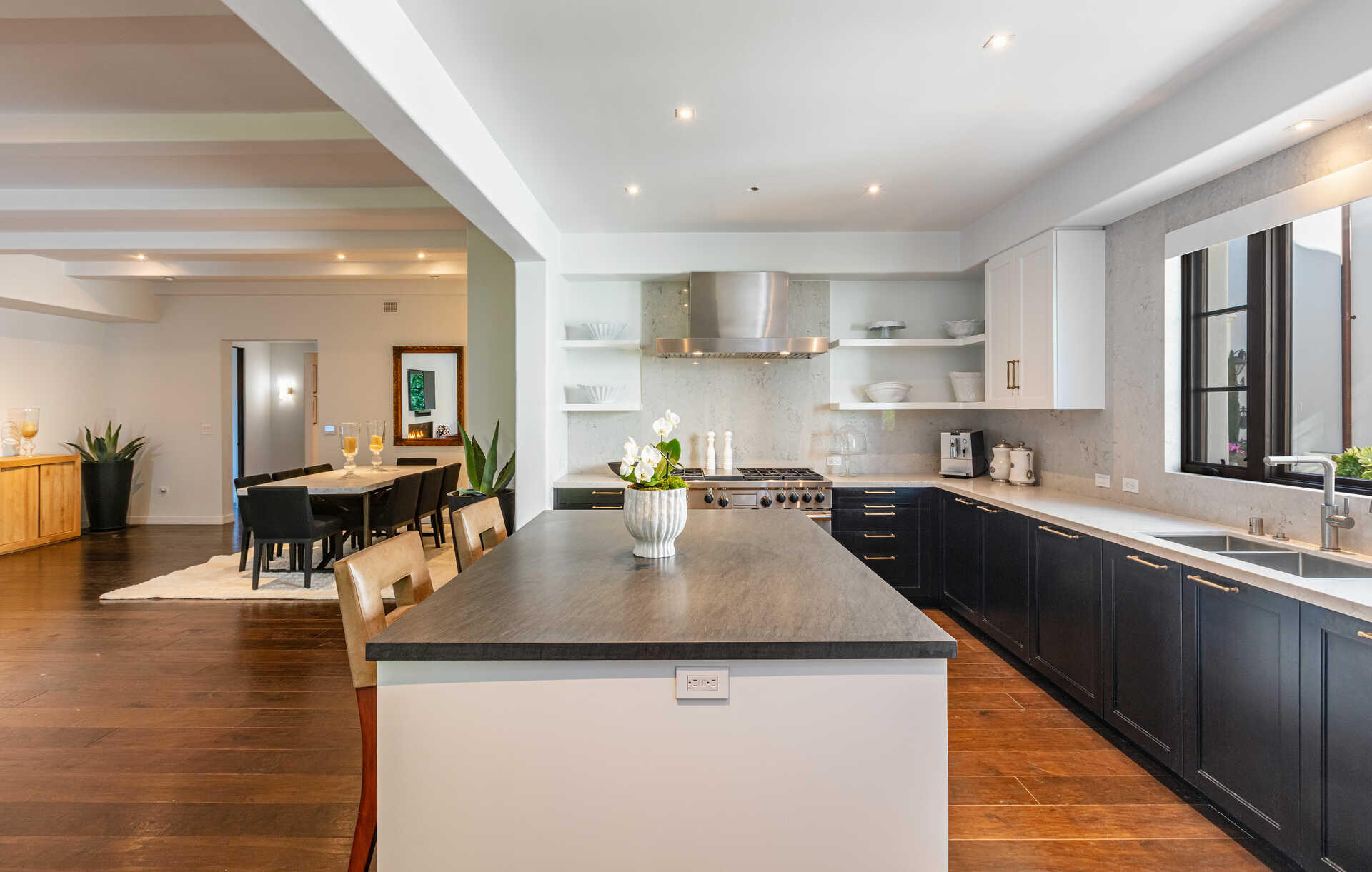 107 Olive Mill Road Santa Barbara, CA 93108 - Photo 19 of 39 a kitchen with counter top space a sink appliances and cabinets