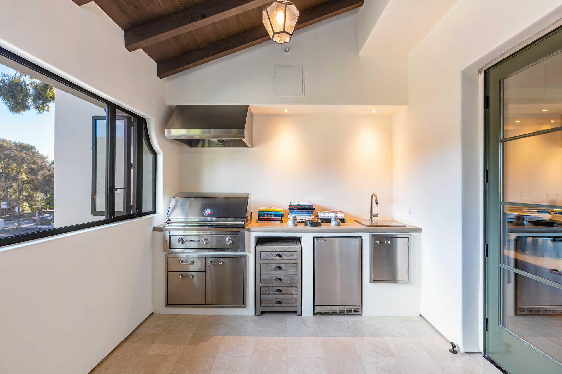 107 Olive Mill Road Santa Barbara, CA 93108 - Photo 28 of 39 a kitchen with stainless steel appliances granite countertop a stove and a refrigerator