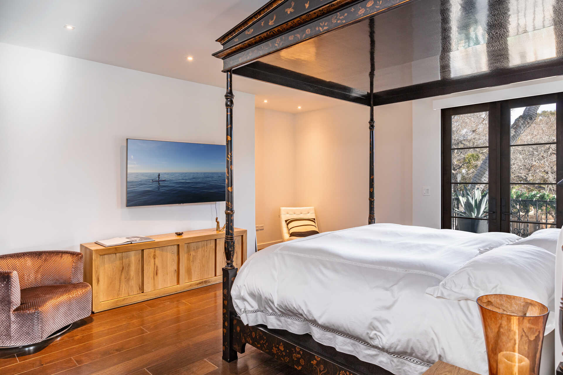 107 Olive Mill Road Santa Barbara, CA 93108 - Photo 31 of 39 a bedroom with a bed and a flat screen tv