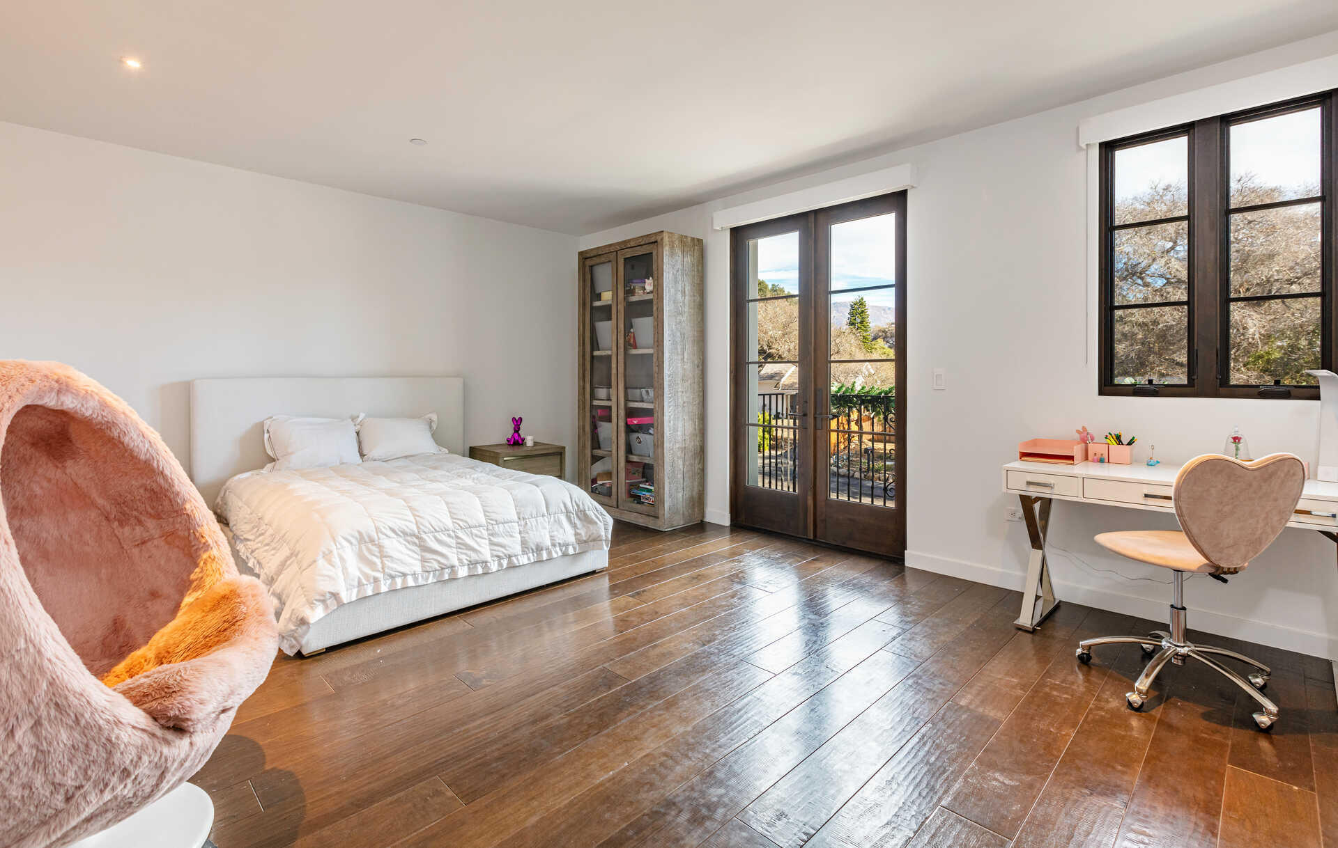 107 Olive Mill Road Santa Barbara, CA 93108 - Photo 34 of 39 a bedroom with a bed and large window