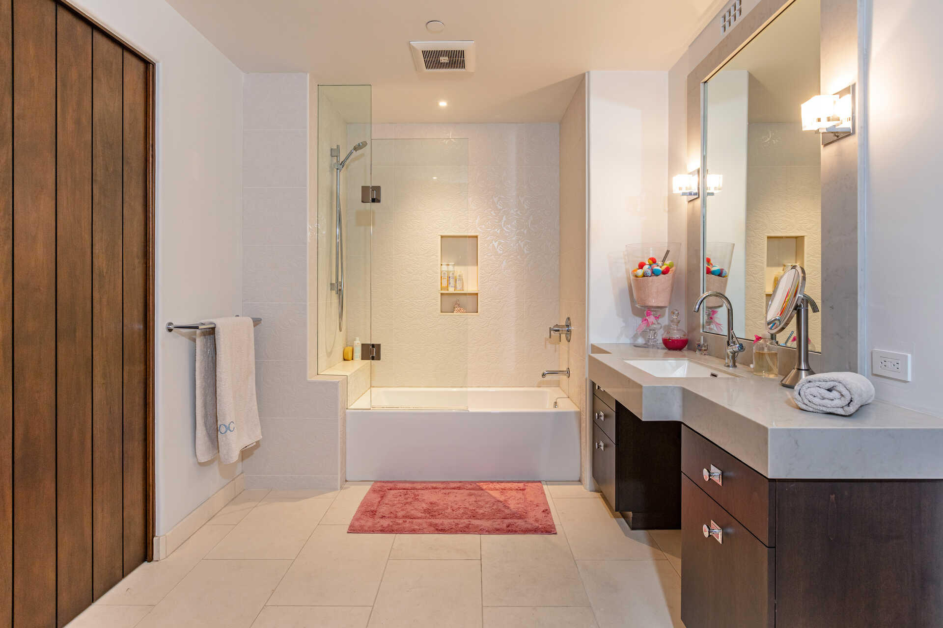 107 Olive Mill Road Santa Barbara, CA 93108 - Photo 36 of 39 a bathroom with a tub a sink and a large mirror