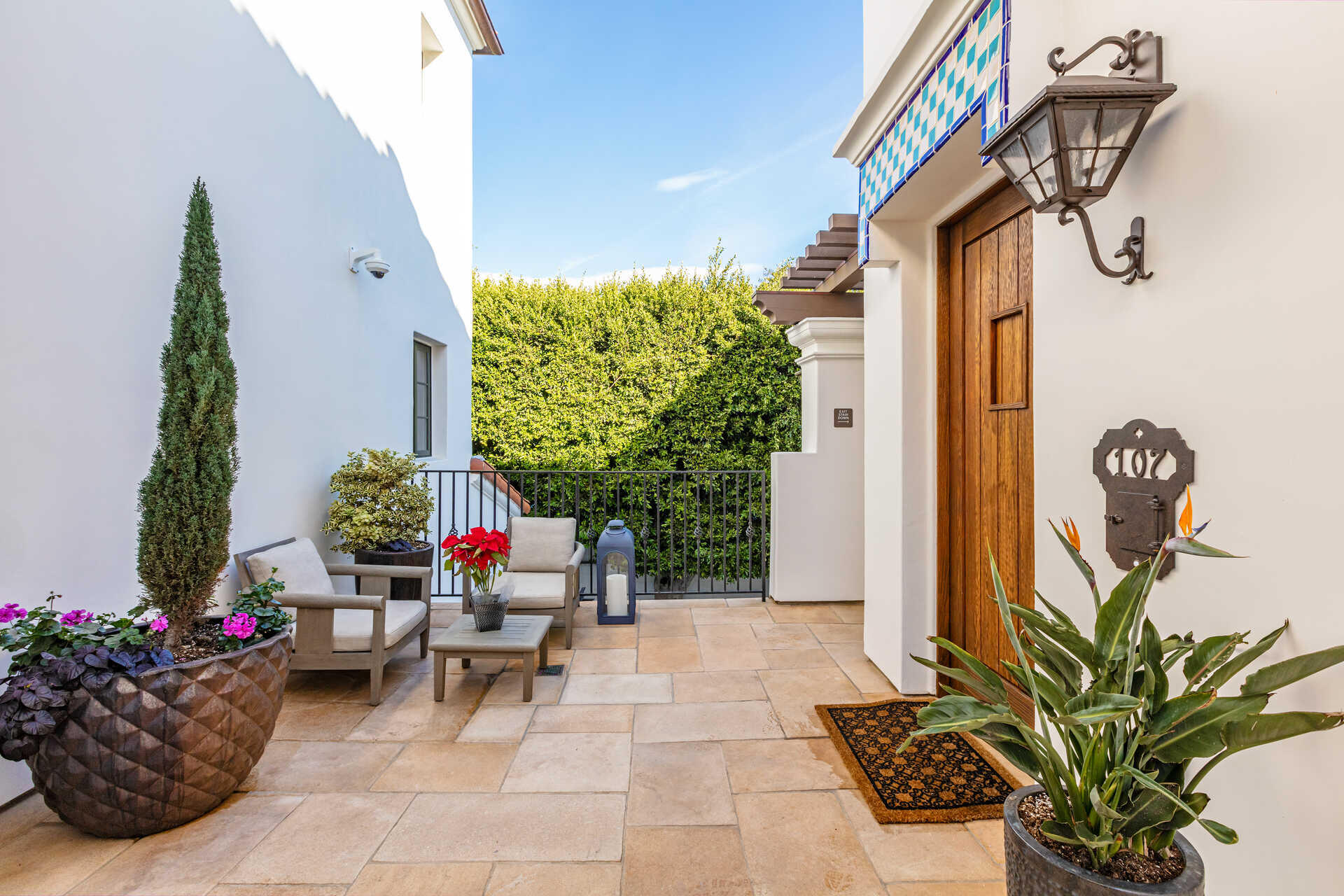 107 Olive Mill Road Santa Barbara, CA 93108 - Photo 8 of 39 a living room filled with furniture and flowers