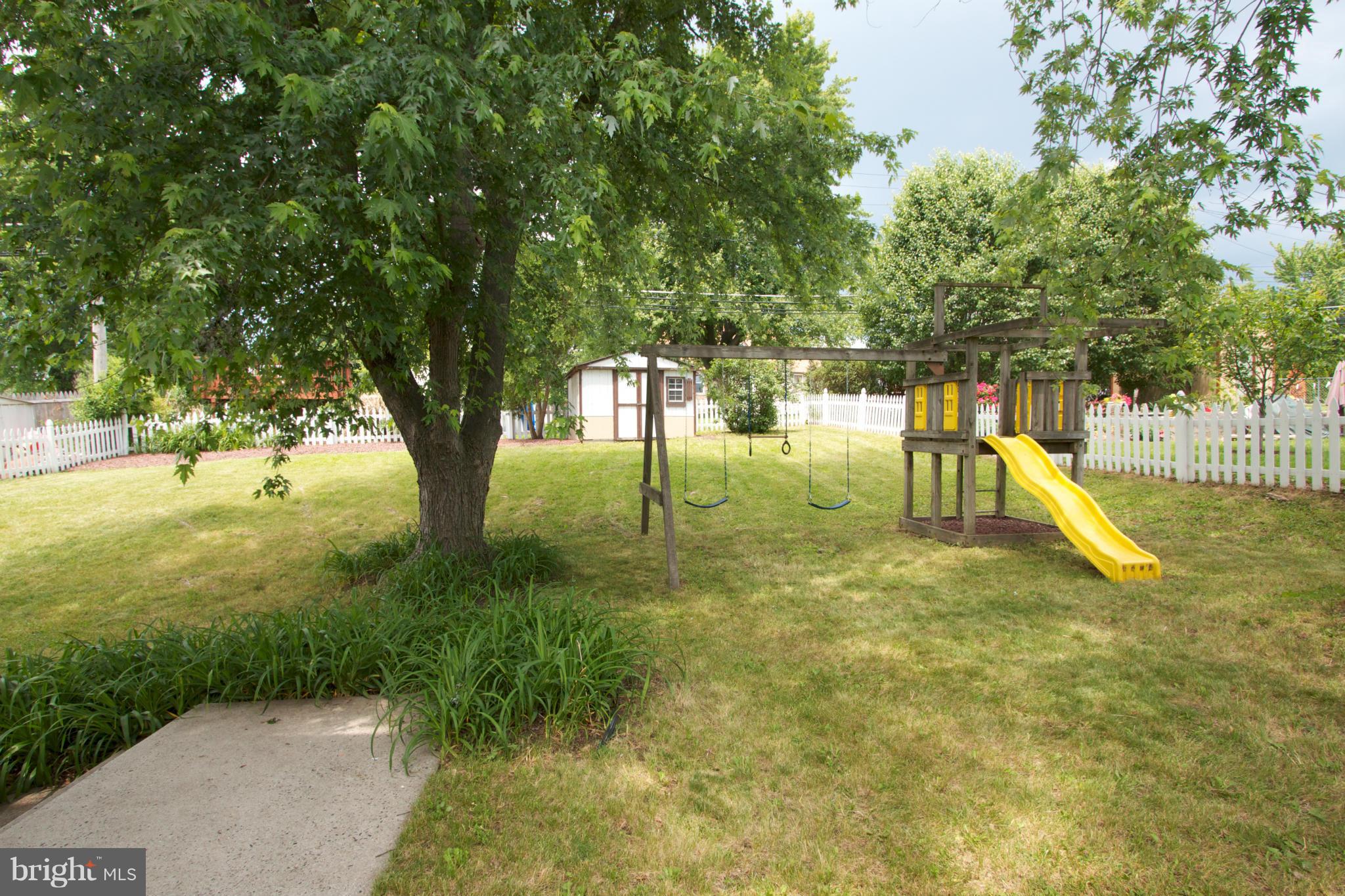 8438 Coco Road Baltimore, MD 21237 - Photo 27 of 29 a view of a yard with a tree