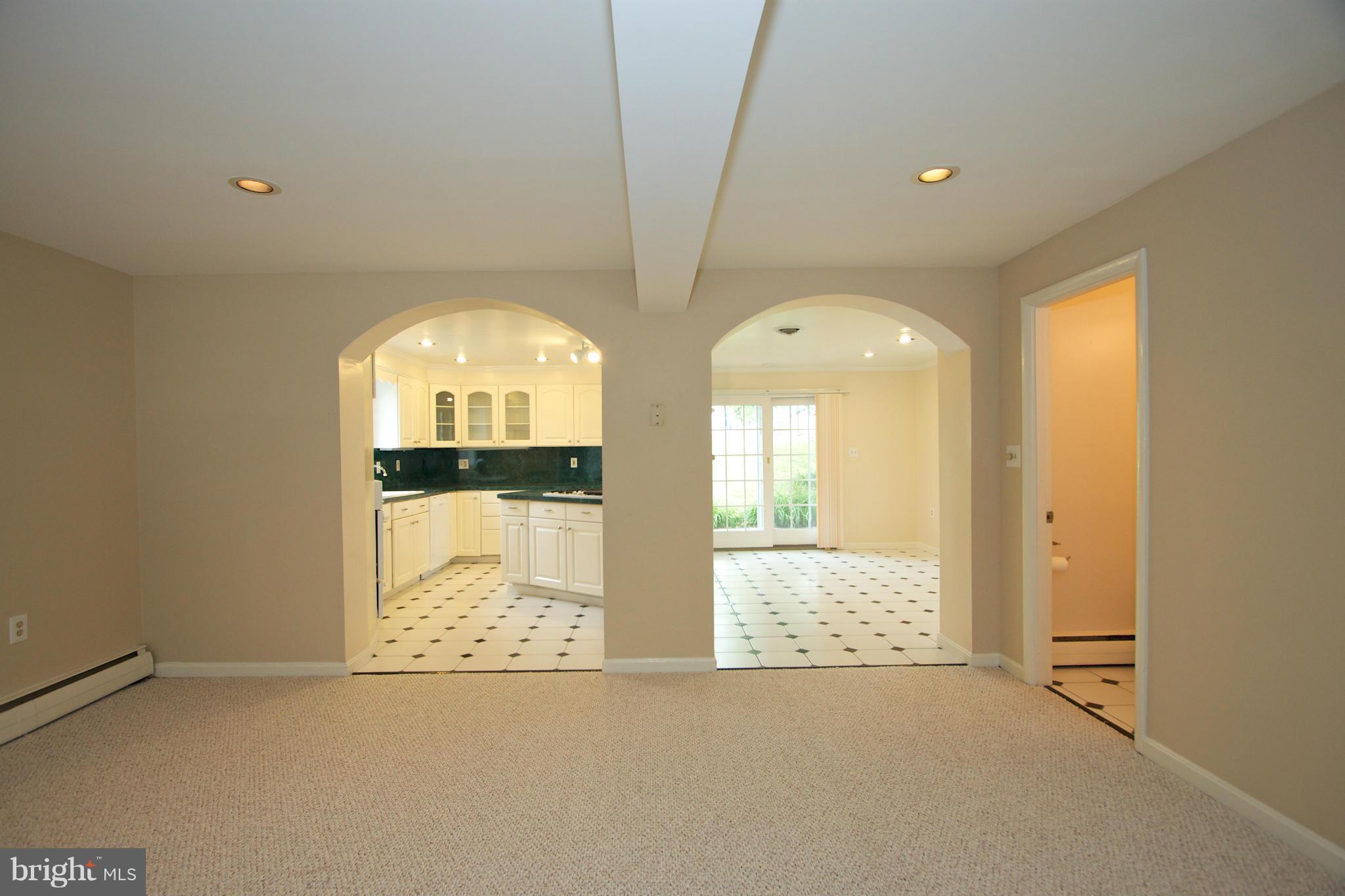 8438 Coco Road Baltimore, MD 21237 - Photo 5 of 29 a view of an empty room and window