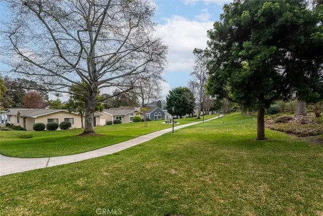 a view of swimming pool from a balcony