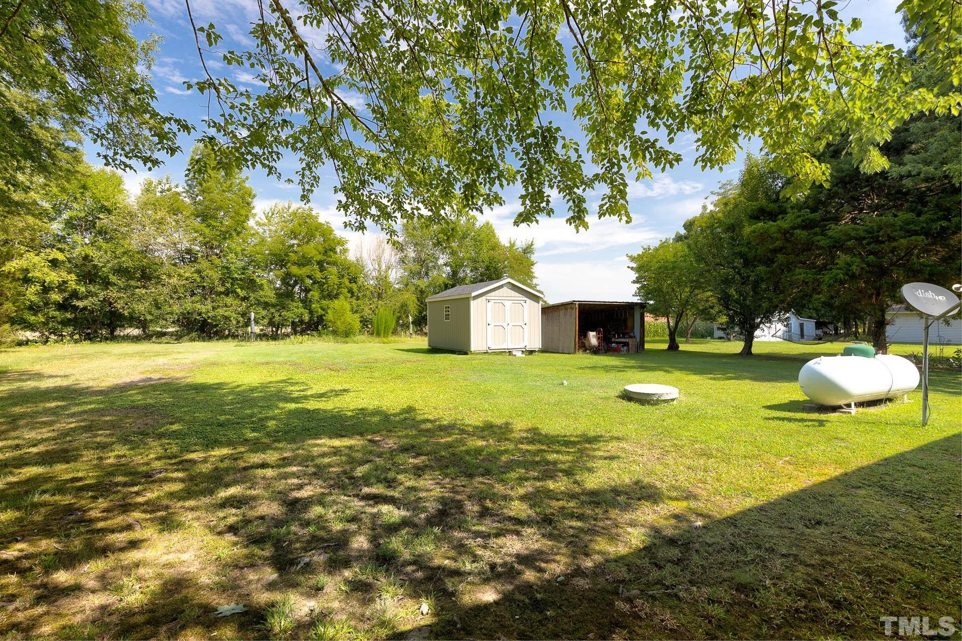 724 Bill Poole Road Rougemont, NC 27572 - Photo 16 of 17 a view of a trees with yard