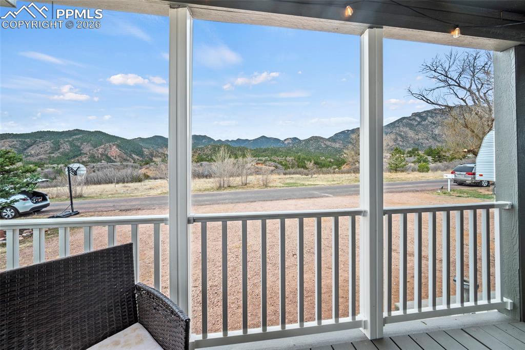 8395 Commanche Road Colorado Springs, CO 80926 - Photo 4 of 29 a view of a city from a balcony