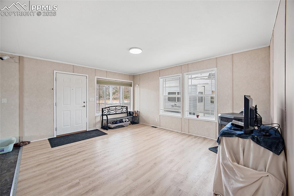 8395 Commanche Road Colorado Springs, CO 80926 - Photo 6 of 29 a view of a room with workspace and a window