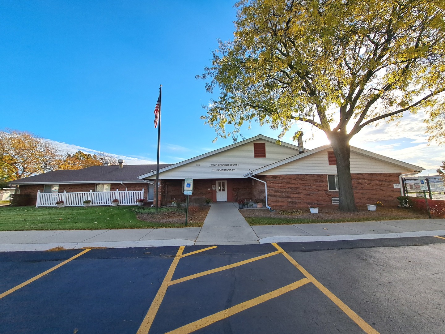 1069 Mohegan Lane Schaumburg, IL 60193 - Photo 30 of 31 a front view of a house with a yard