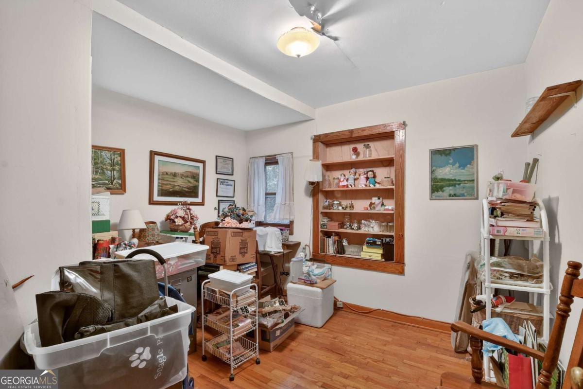 6 Old Aska Curve Blue Ridge, GA 30513 - Photo 21 of 26 a living room with furniture and a bookshelf