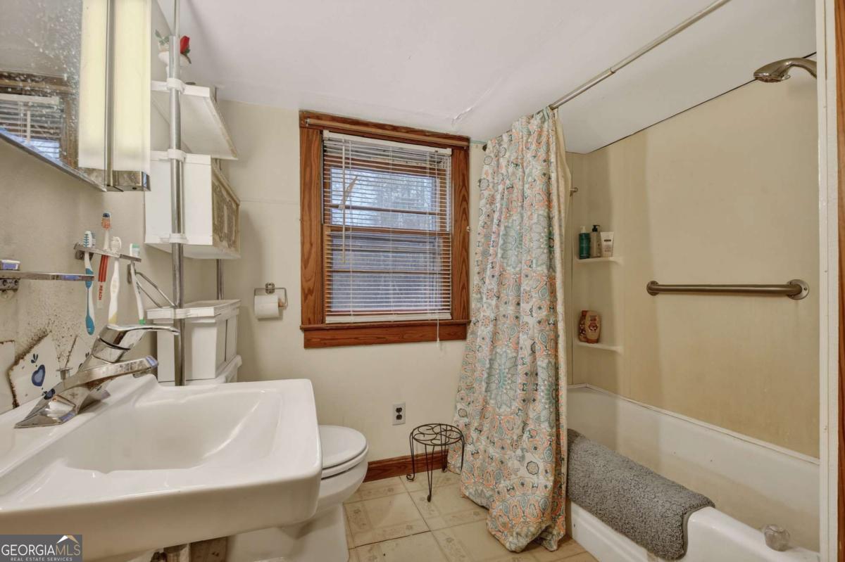 6 Old Aska Curve Blue Ridge, GA 30513 - Photo 22 of 26 a bathroom with a sink and a mirror