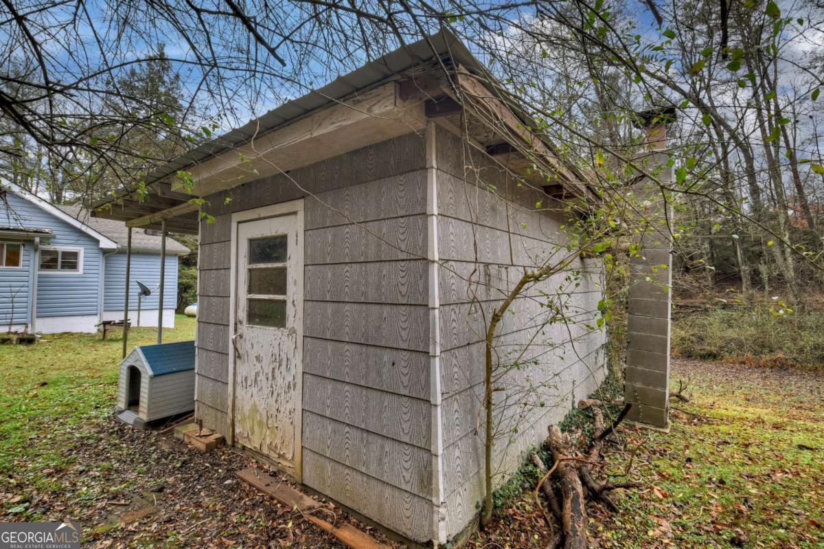 6 Old Aska Curve Blue Ridge, GA 30513 - Photo 9 of 26 a backyard of a house with lots of green space