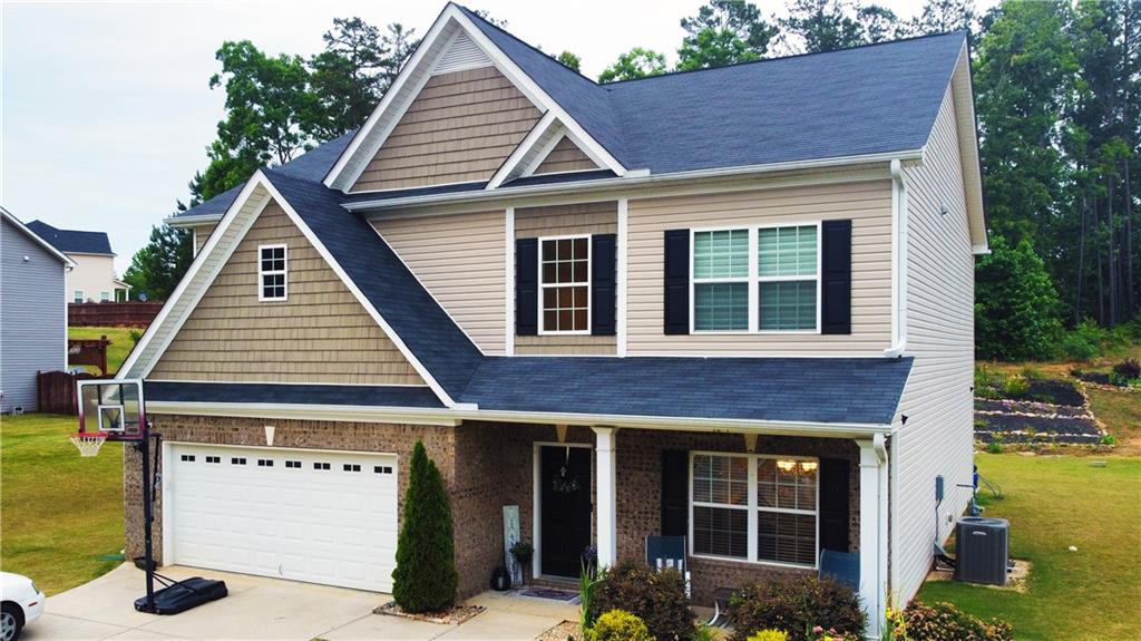 330 Windpher Ridge Hampton, GA 30228 - Photo 1 of 1 a view of a house with sitting area