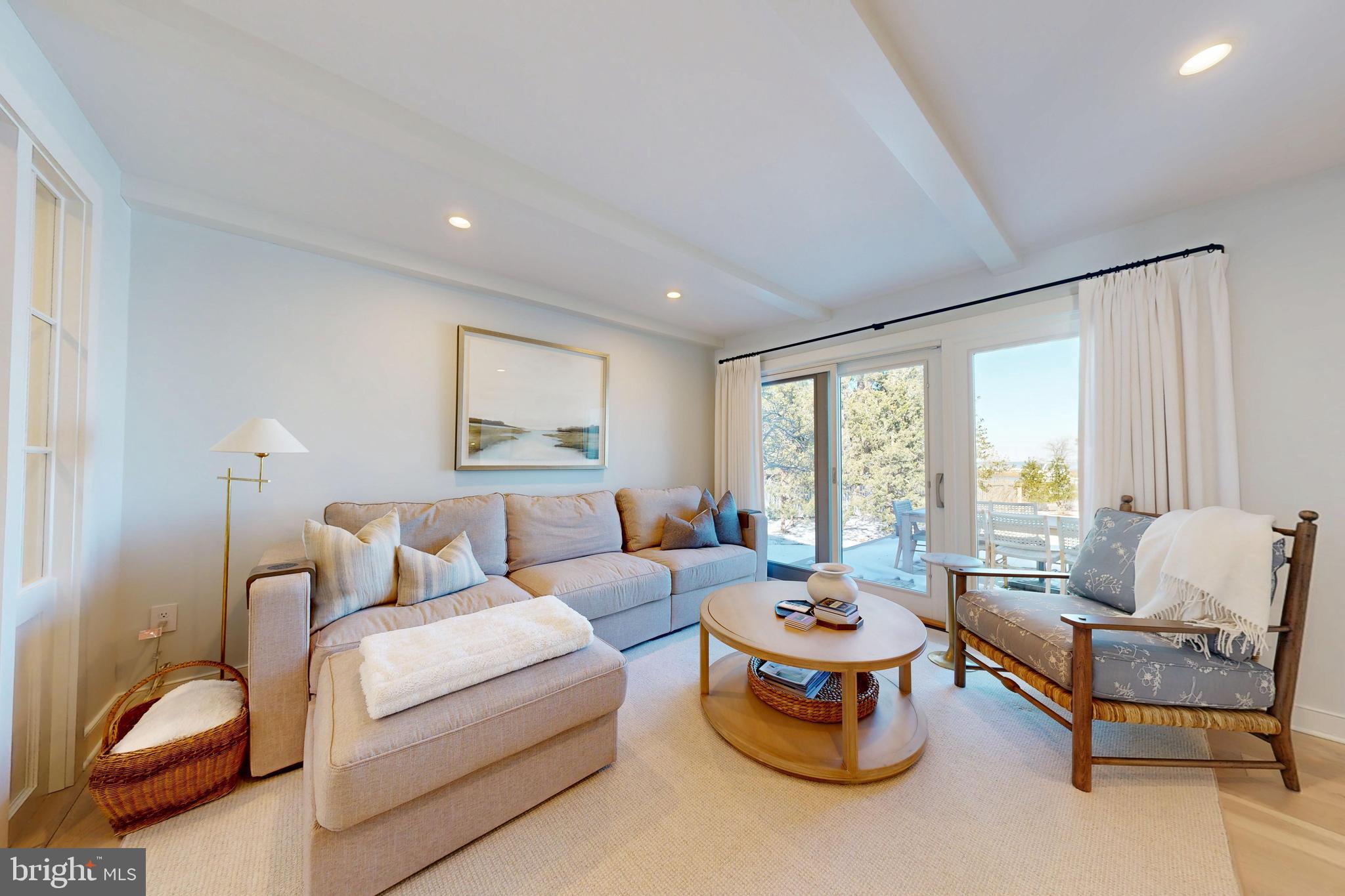 601 Cove Road St. Michaels, MD 21663 - Photo 18 of 39 a living room with furniture and a large window
