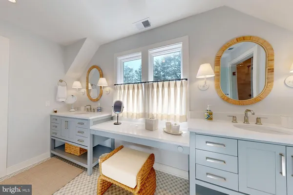 a bed room with a bed and a chandelier