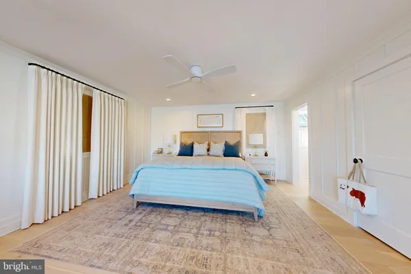a bathroom with a double vanity sink toilet and shower