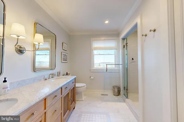 a living room with furniture a fireplace and a table