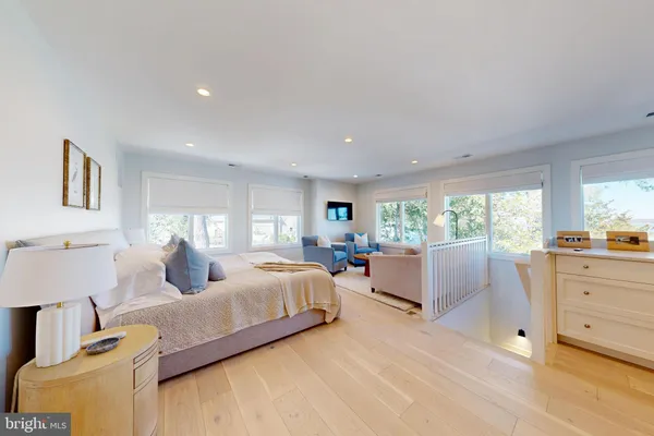 a very nice looking dining room with a large window and dining table